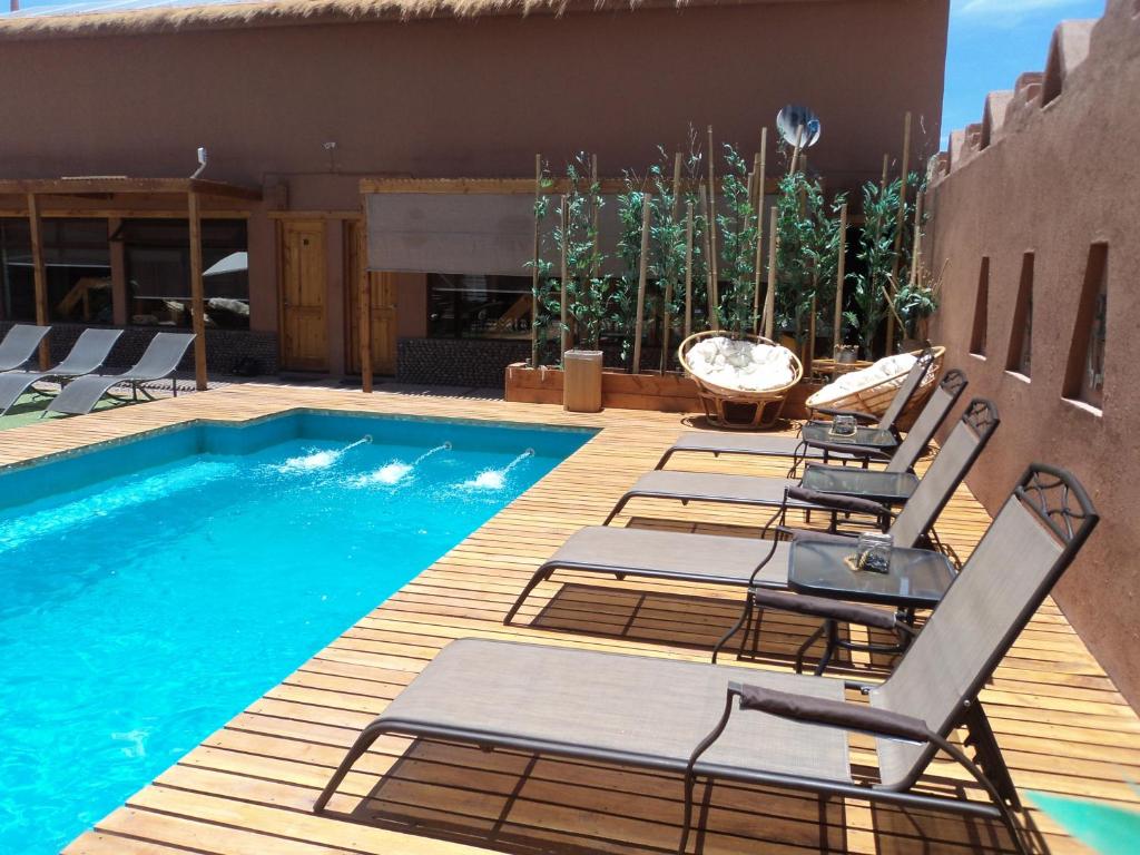 Bazén v ubytování Hoteles Pueblo de Tierra nebo v jeho okolí