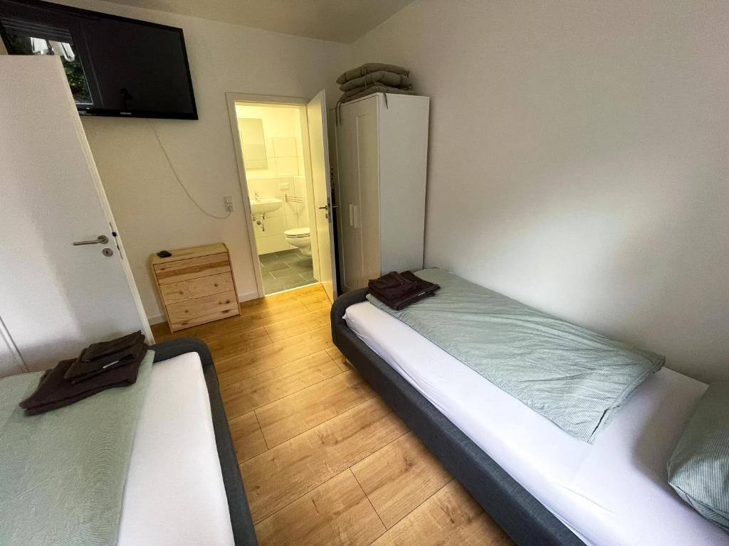 Postel nebo postele na pokoji v ubytování Appartement No 5