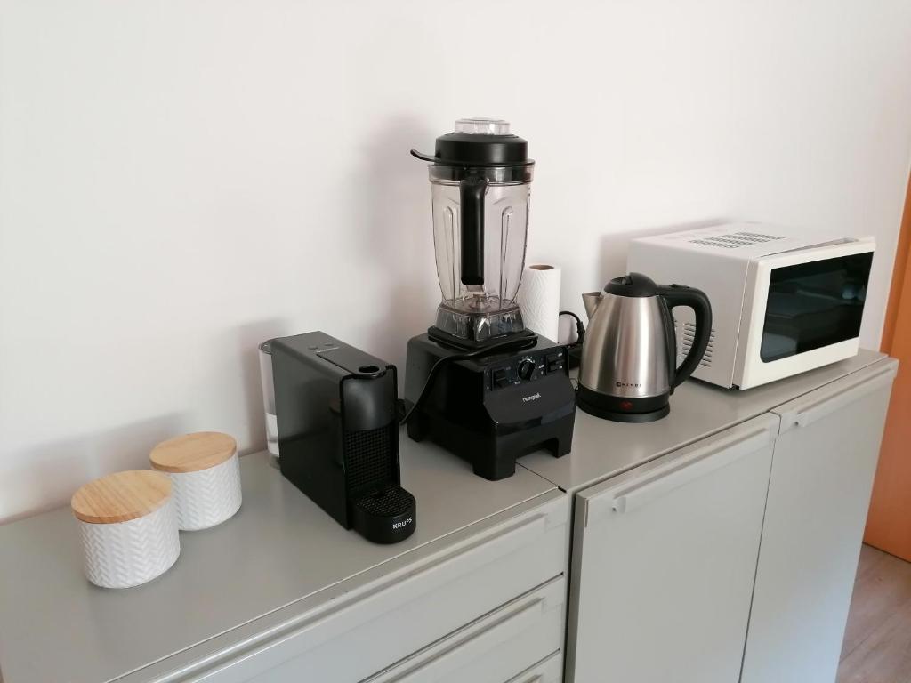 Príslušenstvo na prípravu kávy alebo čaju v ubytovaní Ferienwohnung Saunahaus