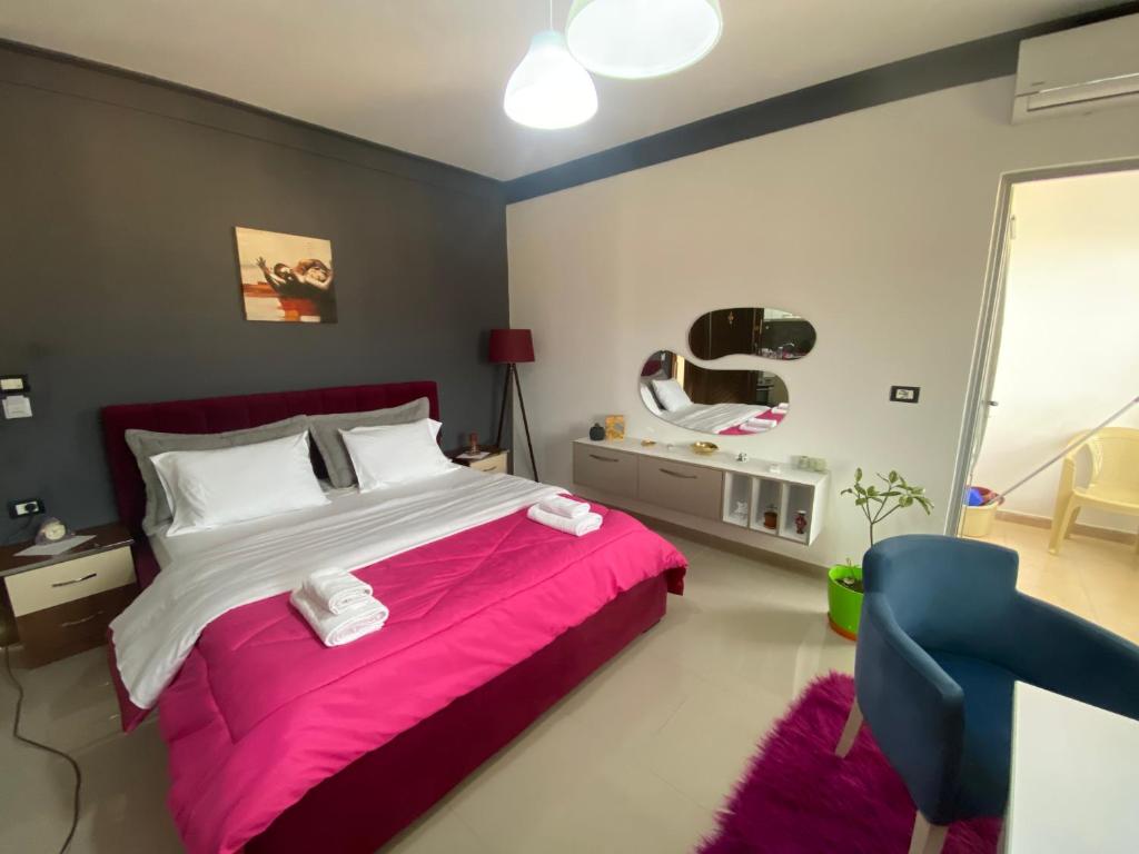 Postel nebo postele na pokoji v ubytování Guest's Apartament