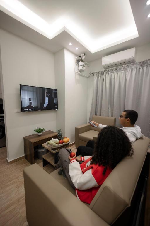 TV a/nebo společenská místnost v ubytování Royal Inn Residence New Cairo