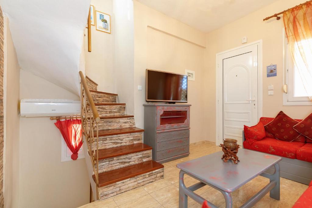 Televízia a/alebo spoločenská miestnosť v ubytovaní Varveri's House