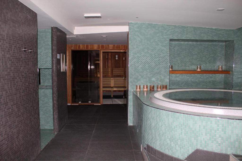 Kopalnica v nastanitvi Hotel Alpina