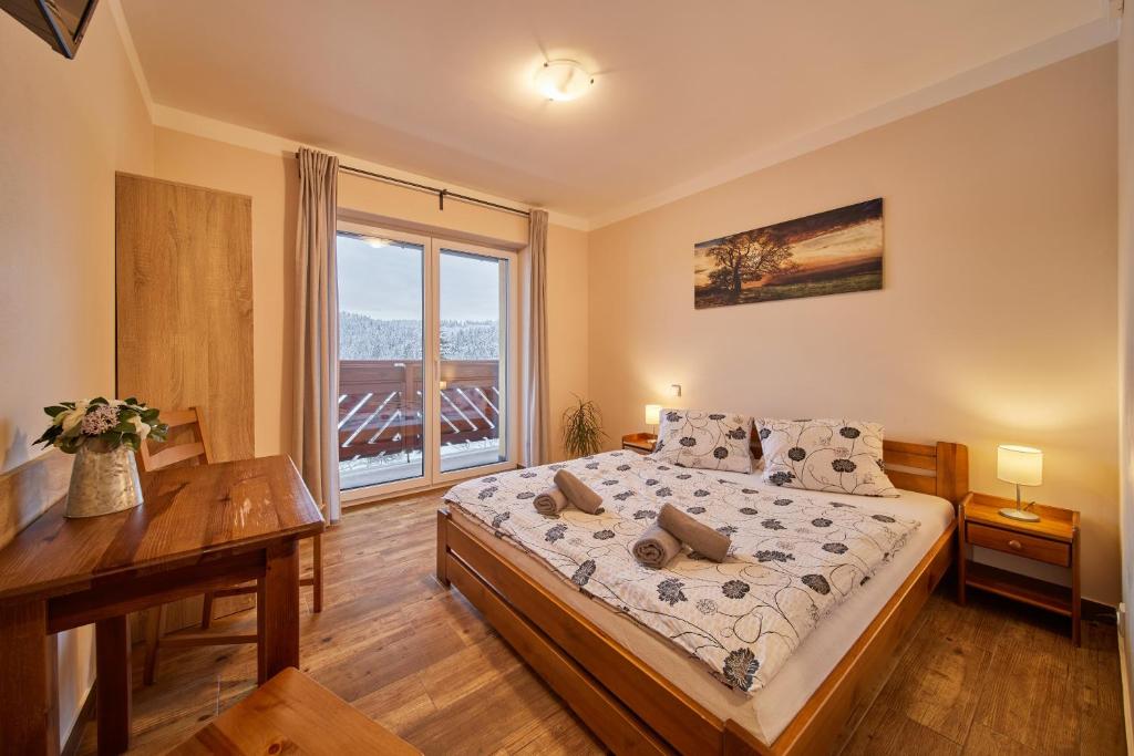 Postel nebo postele na pokoji v ubytování Residence Ruth
