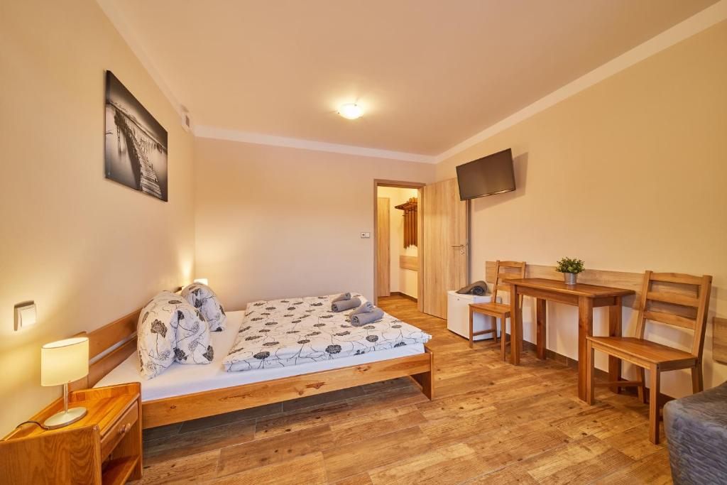 Postel nebo postele na pokoji v ubytování Residence Ruth