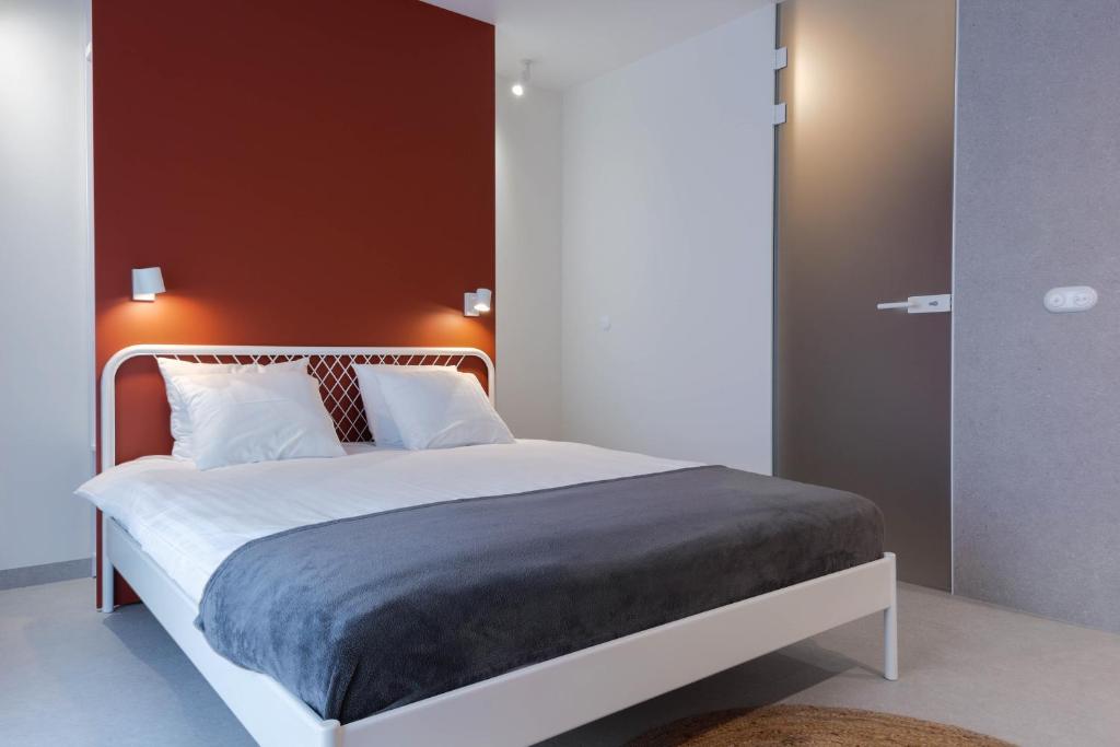 Łóżko lub łóżka w pokoju w obiekcie Odra Apartments