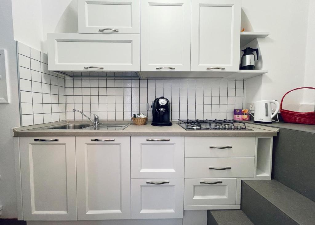 A kitchen or kitchenette at B&B CORSO VITTORIO