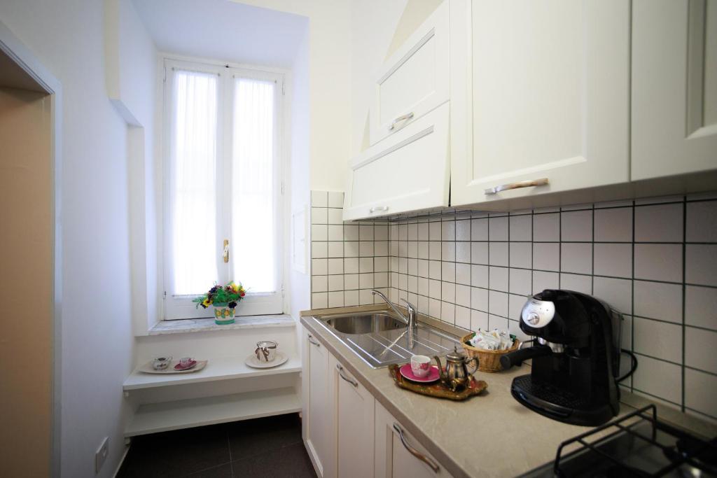 A kitchen or kitchenette at B&B CORSO VITTORIO
