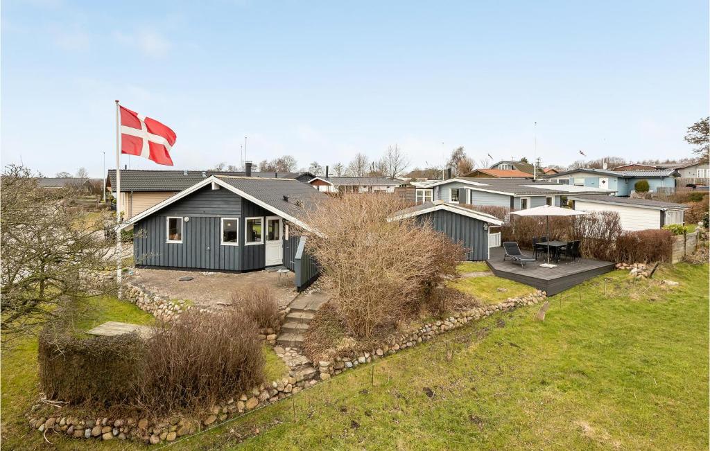 an aerial view of a house with a canadian flag at Lovely Home In Broager With Wifi in Broager