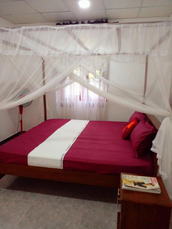 Postel nebo postele na pokoji v ubytování Sandew Residence