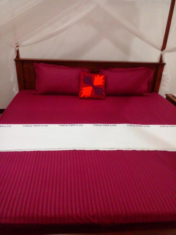 Postel nebo postele na pokoji v ubytování Sandew Residence