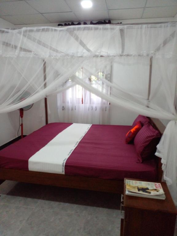 Postel nebo postele na pokoji v ubytování Sandew Residence