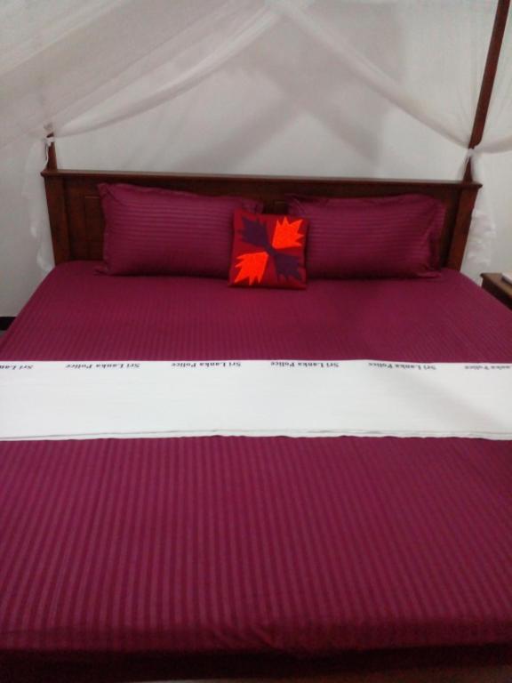Postel nebo postele na pokoji v ubytování Sandew Residence