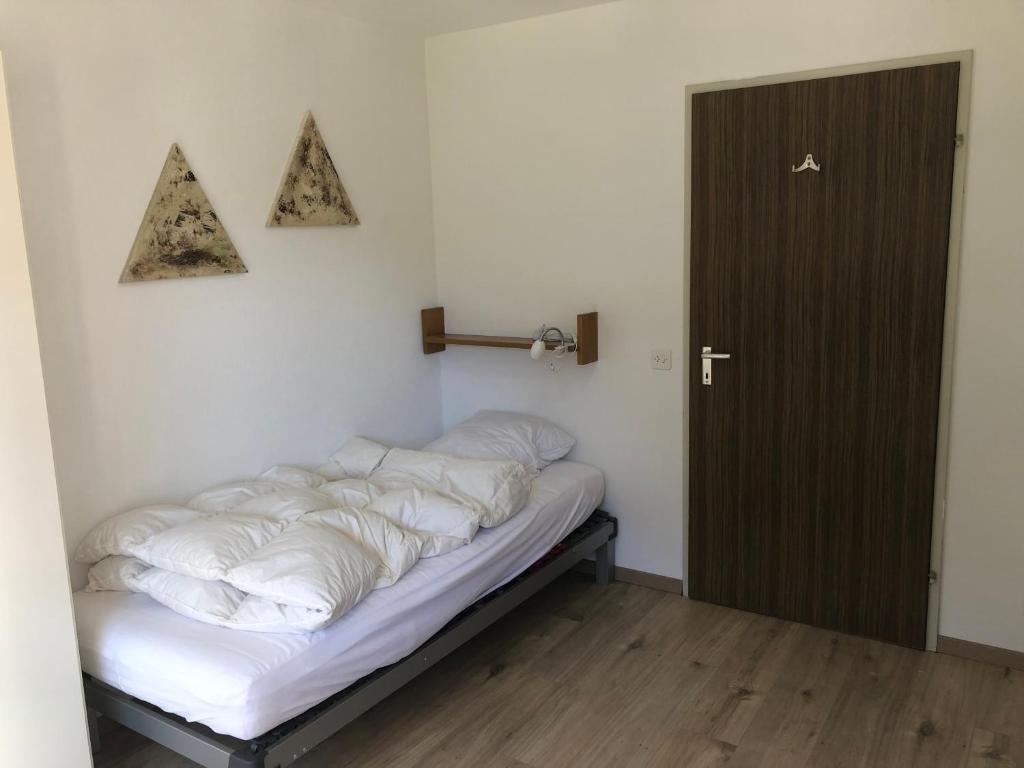 Postel nebo postele na pokoji v ubytování Breiten 1