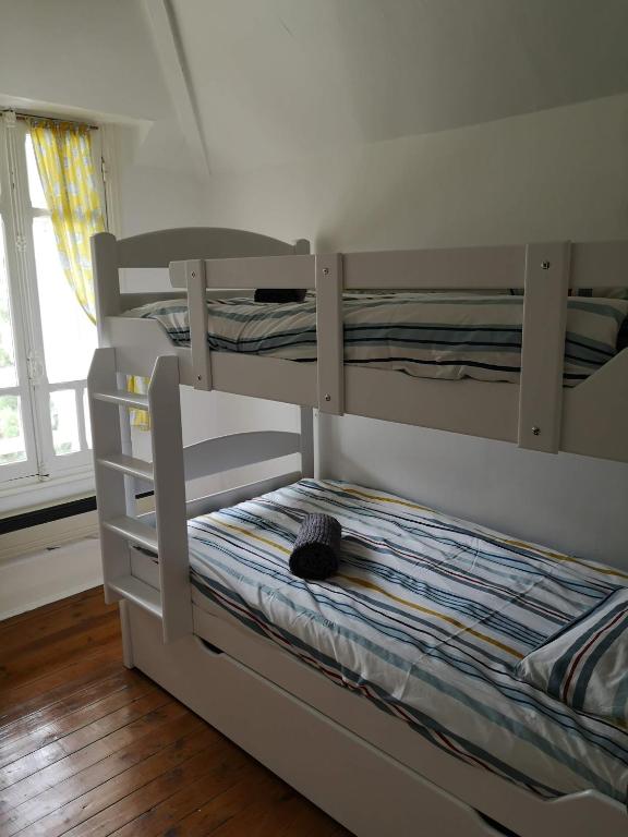 Postel nebo postele na pokoji v ubytování Villa Les Cormorans, Vue Mer, 10 personnes