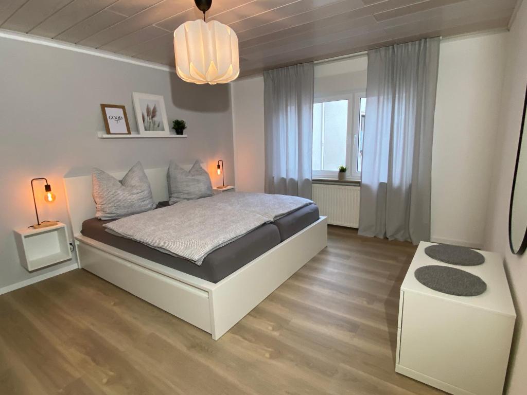 Postel nebo postele na pokoji v ubytování Ferienwohnung Loreley Mittelrheintal