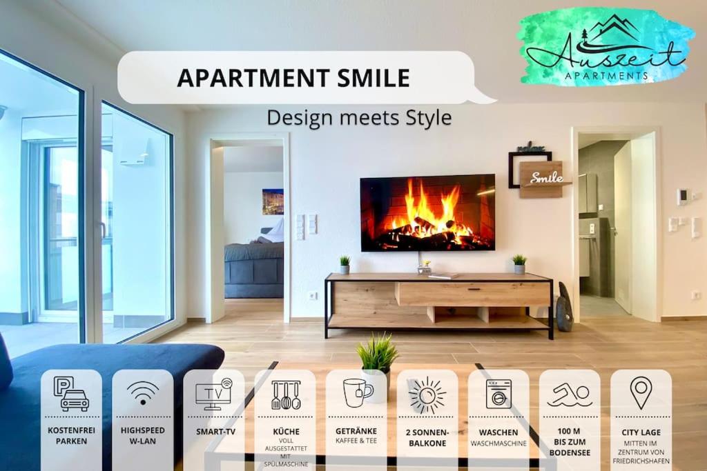 TV i/ili zabavni centar u objektu Auszeit Apartment SMILE am Uferpark - nur 100 m bis zum Bodensee, direkt am Bodenseeradweg, 2 Schlafzimmer, 2 Sonnenbalkone, schnelles WLAN, kostenloser Tiefgaragenstellplatz, für bis zu 4 Personen