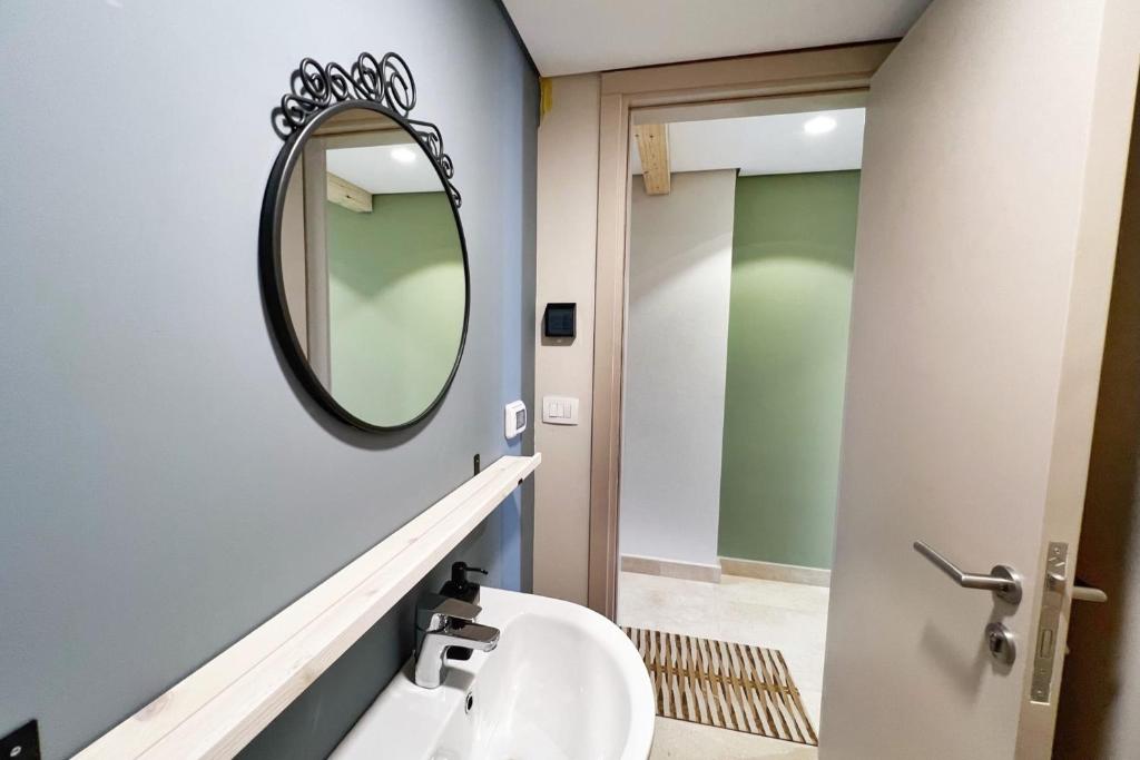 A bathroom at Spectacular & Soaring 2 BDR w Private Rooftop Jacuzzi & Beach Access