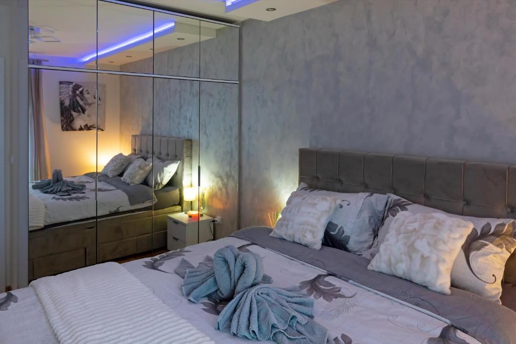 Ένα ή περισσότερα κρεβάτια σε δωμάτιο στο ENNA - new and cosy with private PARKING