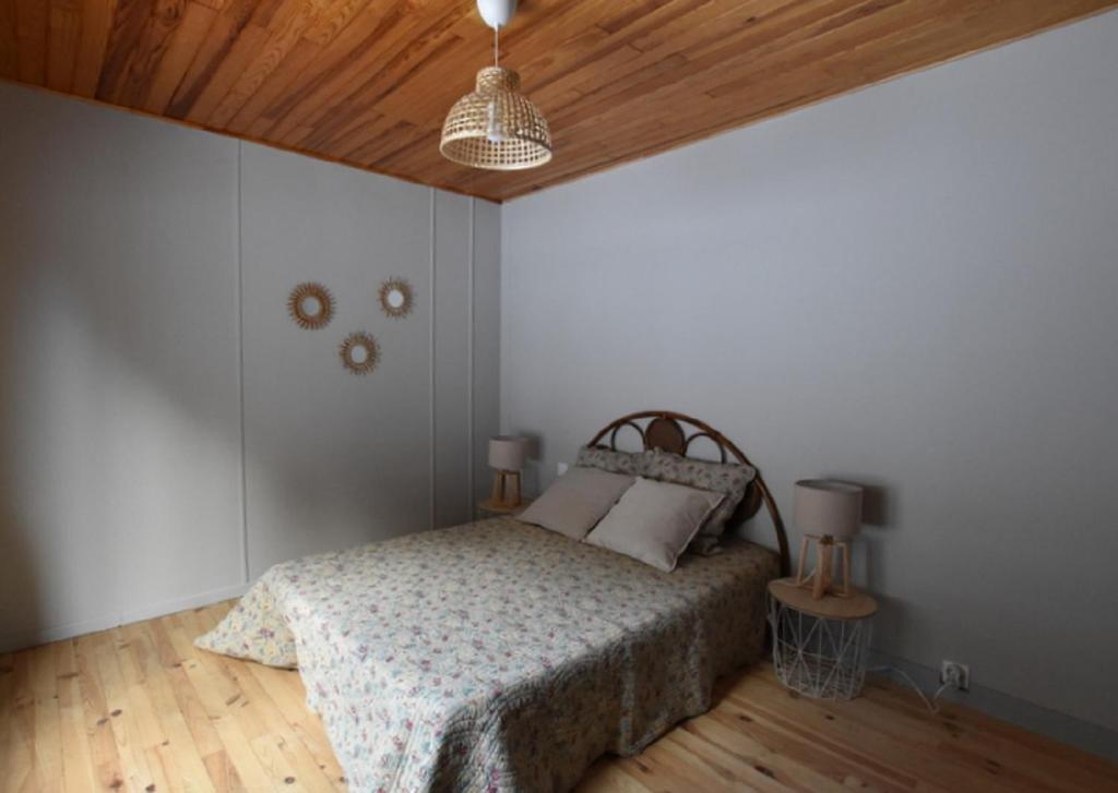 Łóżko lub łóżka w pokoju w obiekcie Chalet de montagne