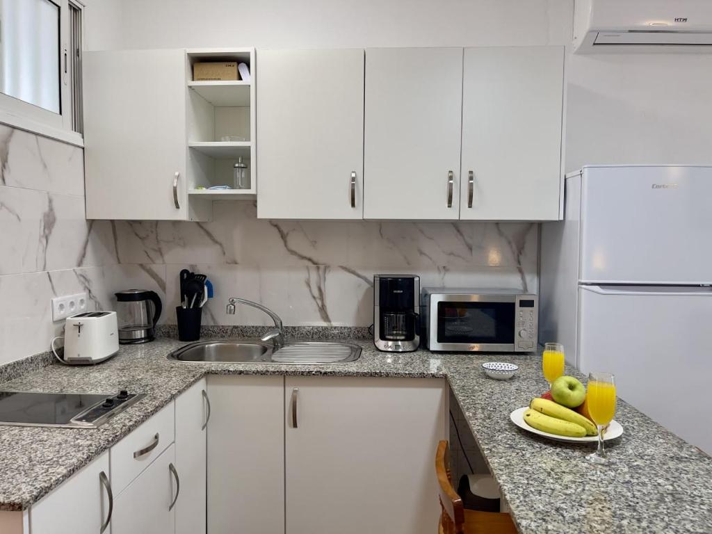Kuchyňa alebo kuchynka v ubytovaní Casa Lindi - Apartment near Puerto Rico beach