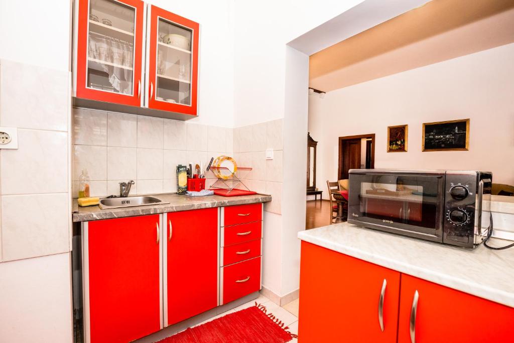 Kuchyňa alebo kuchynka v ubytovaní B&B Old City Center