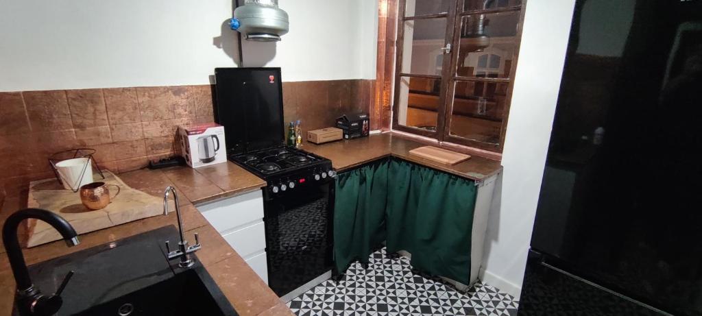 Kuchyňa alebo kuchynka v ubytovaní Private Apartament Wroniecka 6 - parking