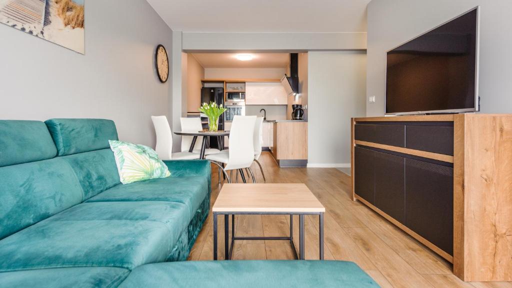 Kuchyňa alebo kuchynka v ubytovaní Apartament Złota Perła z parkingiem 16 E Perłowa Przystań - Holiday City