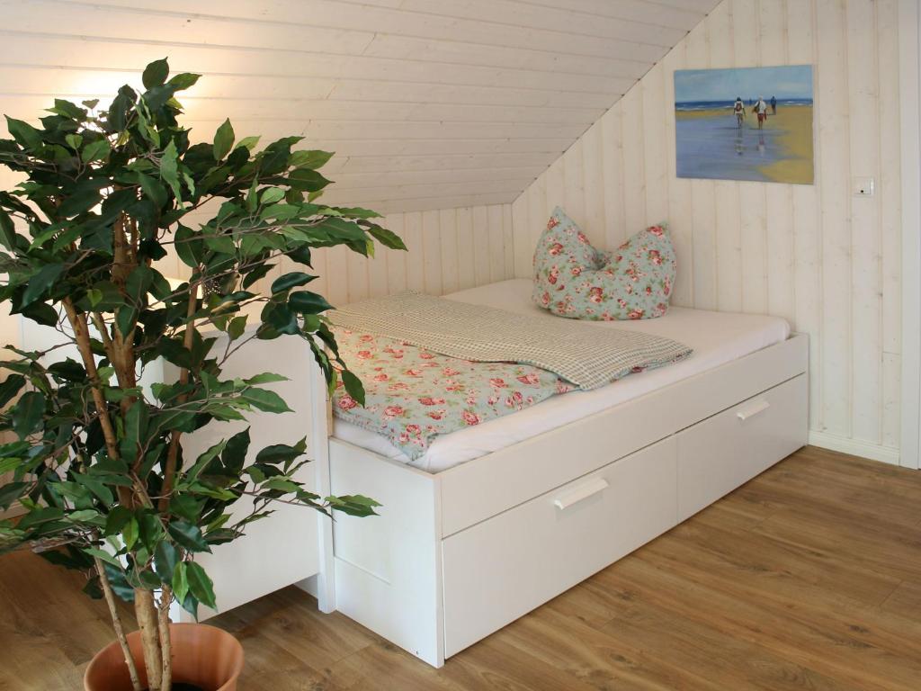 Postel nebo postele na pokoji v ubytování Apartments im Schwedenstil