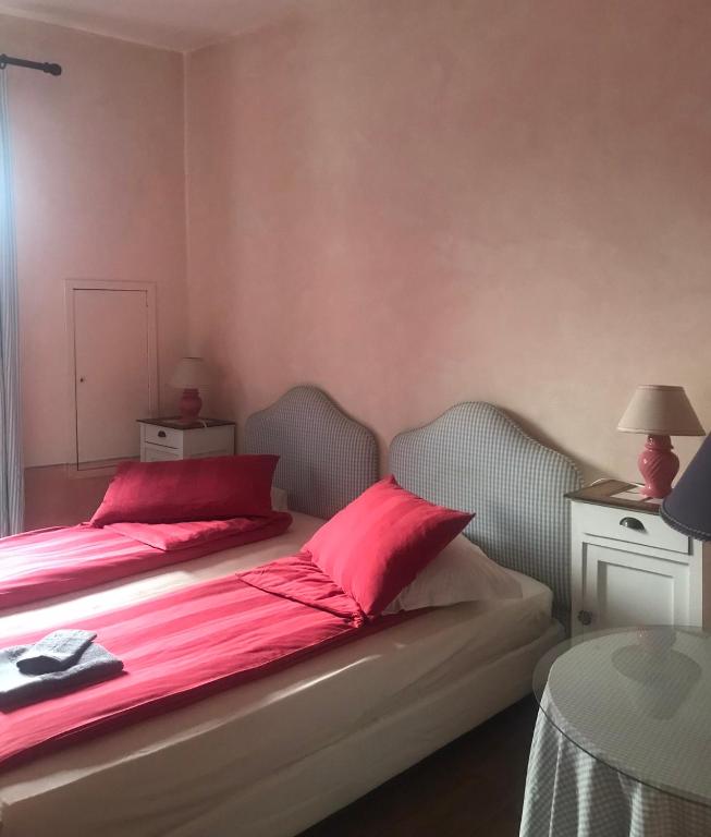 Postel nebo postele na pokoji v ubytování Borgo Francia