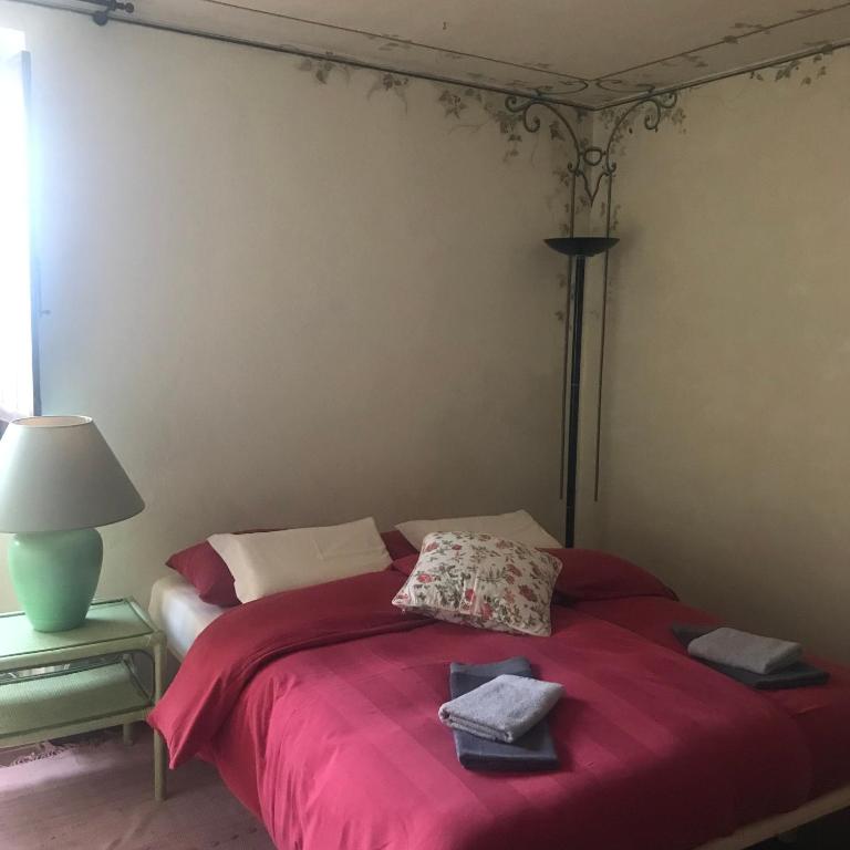 Postel nebo postele na pokoji v ubytování Borgo Francia