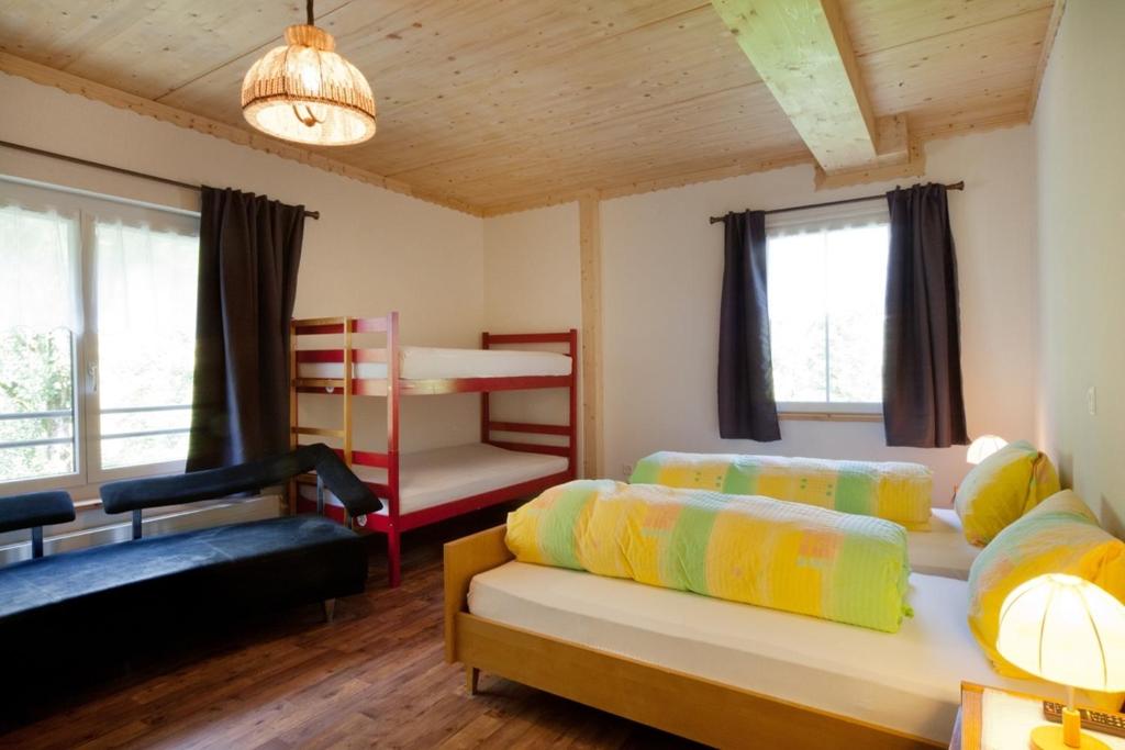 Postel nebo postele na pokoji v ubytování Hotel Gemse
