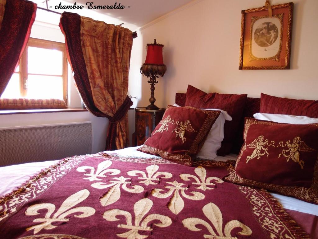 Postel nebo postele na pokoji v ubytování Hotel Le Saint Laurent
