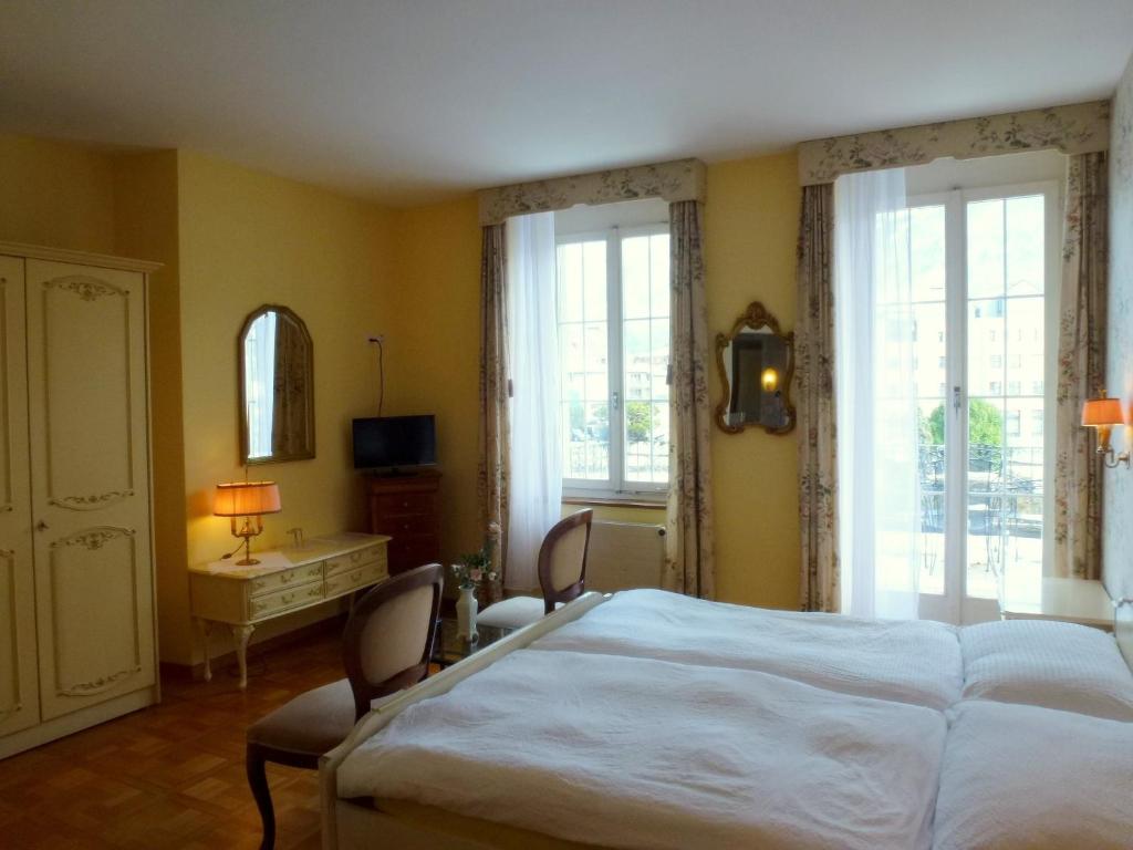 Postel nebo postele na pokoji v ubytování Hotel Central Continental