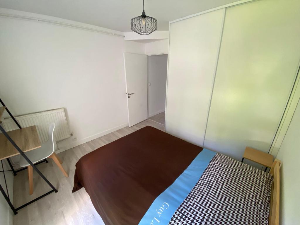 Posteľ alebo postele v izbe v ubytovaní Magnifique appartement à deux pas du centre ville!