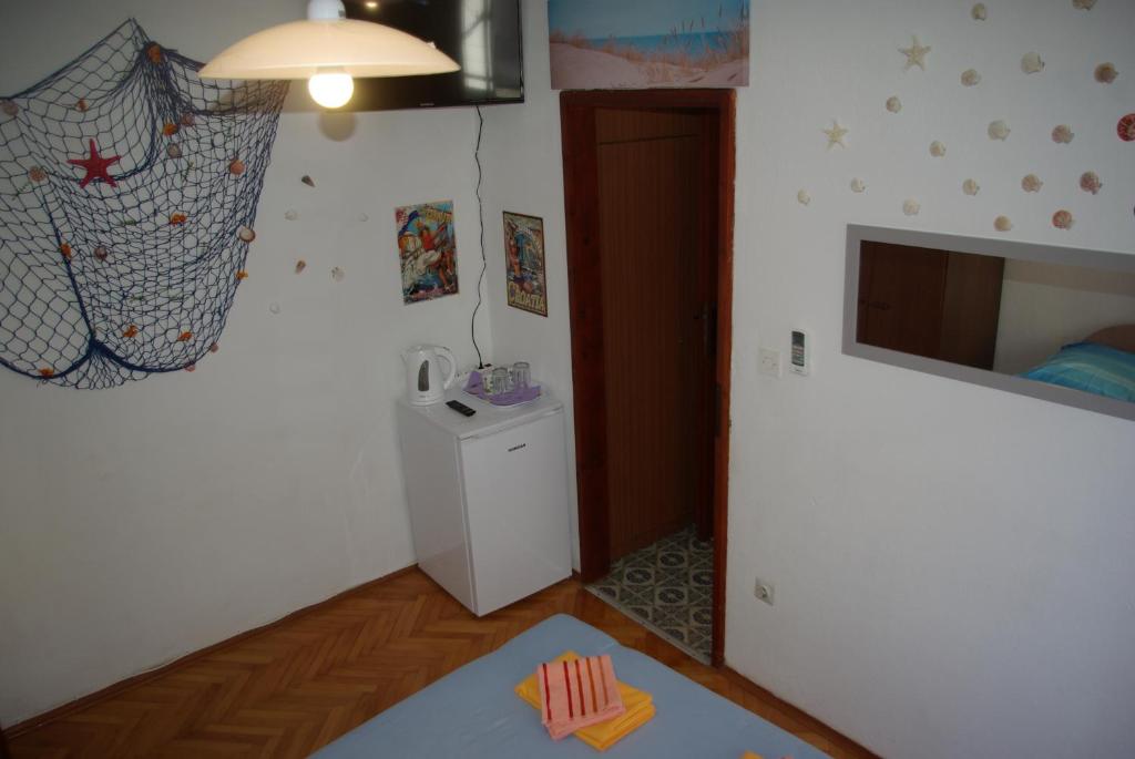 Kuchyň nebo kuchyňský kout v ubytování Rooms Tia