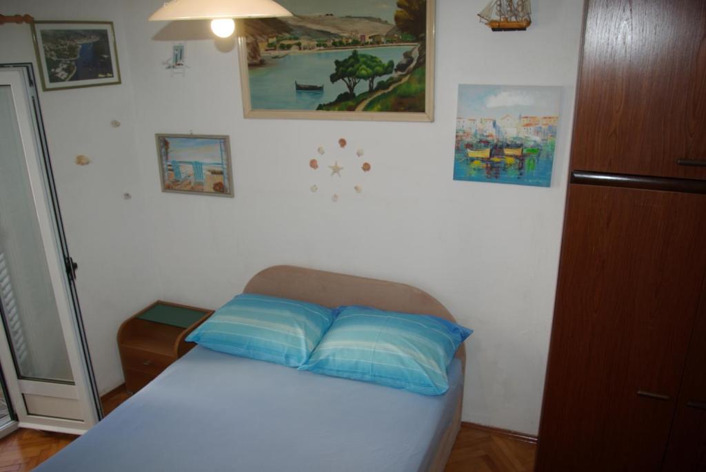 Postel nebo postele na pokoji v ubytování Rooms Tia