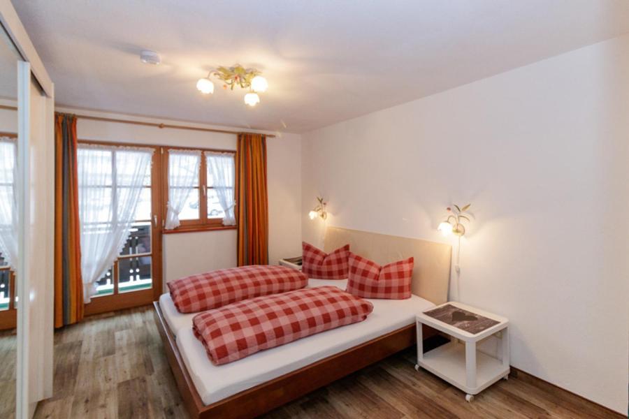 Postel nebo postele na pokoji v ubytování Hotel Binderhäusl