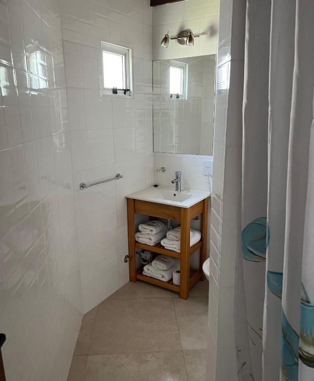 Ein Badezimmer in der Unterkunft Bungalows Bella Vista
