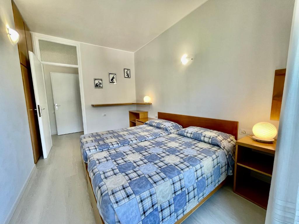 Postel nebo postele na pokoji v ubytování Eden sul Lago di Como