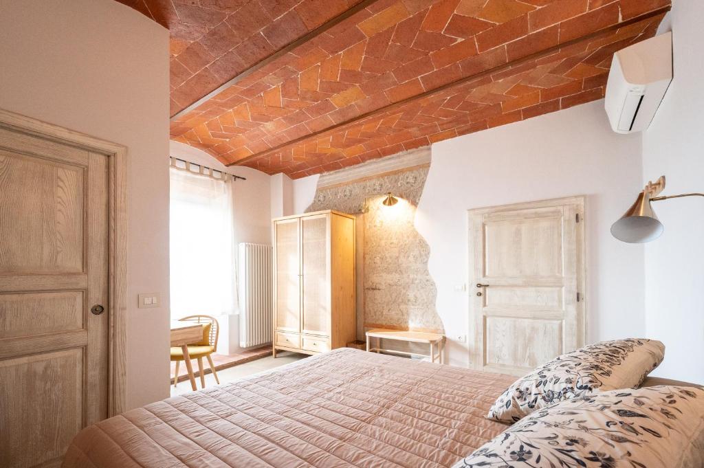 Katil atau katil-katil dalam bilik di Casa La Girandola