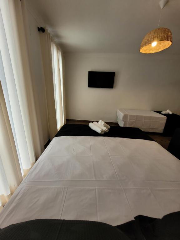 Postel nebo postele na pokoji v ubytování Pelourinho Boutique Hotel - OH HOTÉIS