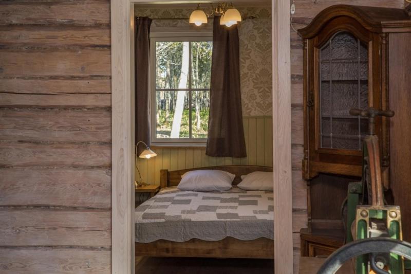 Postel nebo postele na pokoji v ubytování Kernuti House