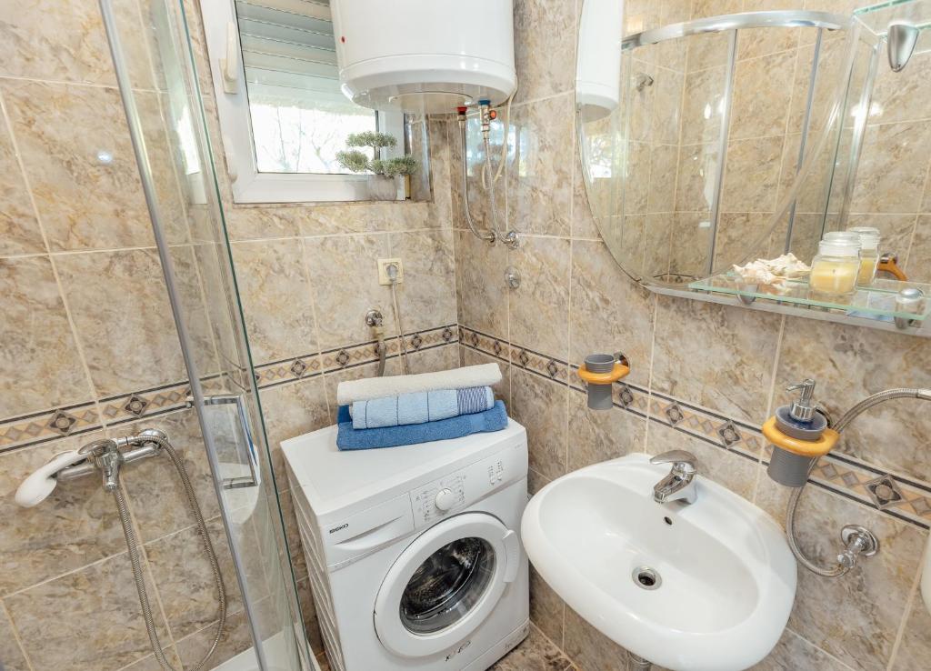 Koupelna v ubytování Apartmani Vico