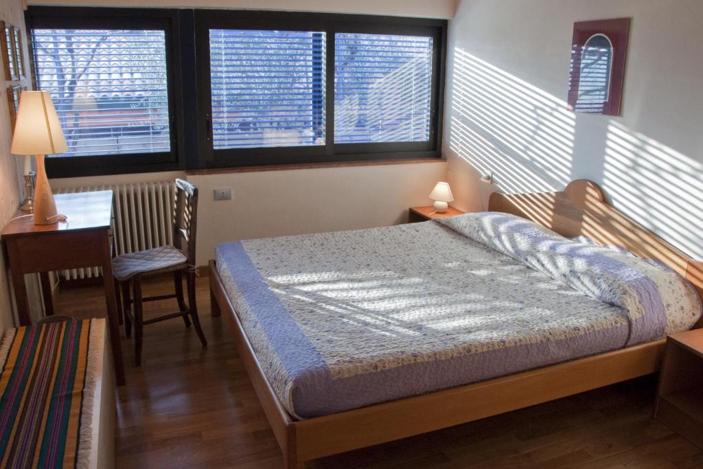 Postel nebo postele na pokoji v ubytování La Casa Trasparente - locazioni brevi