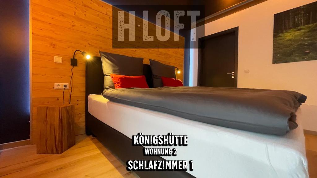 Postel nebo postele na pokoji v ubytování H-Loft Style Apartments
