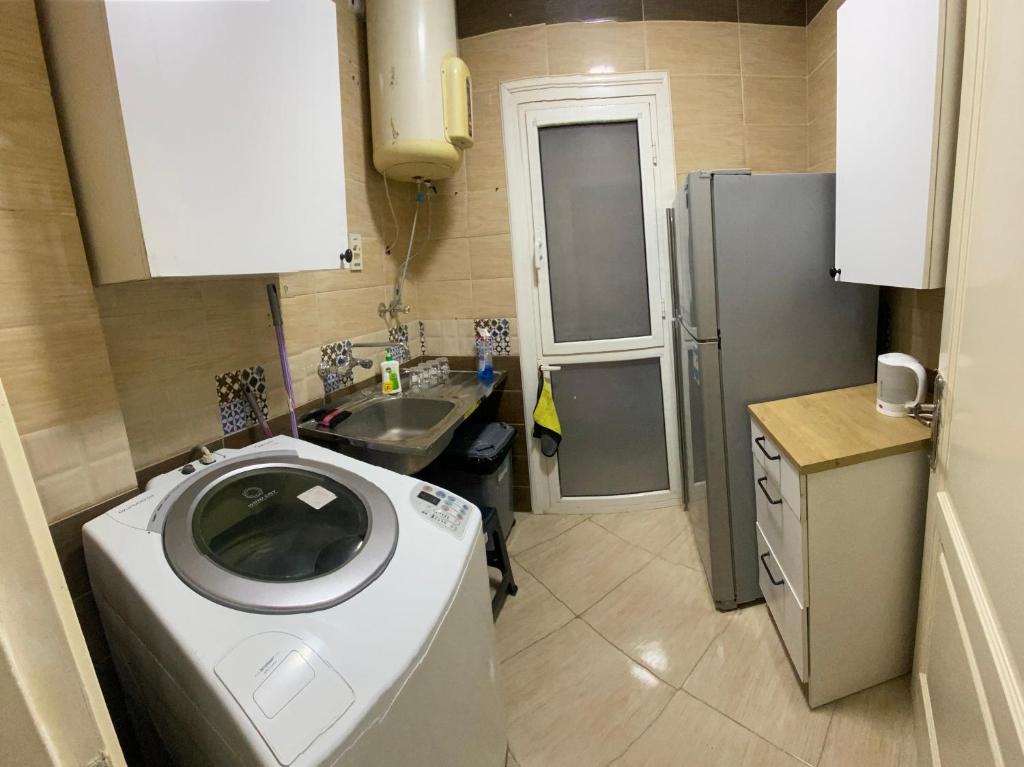 Kuchyň nebo kuchyňský kout v ubytování Your Comfortable Home