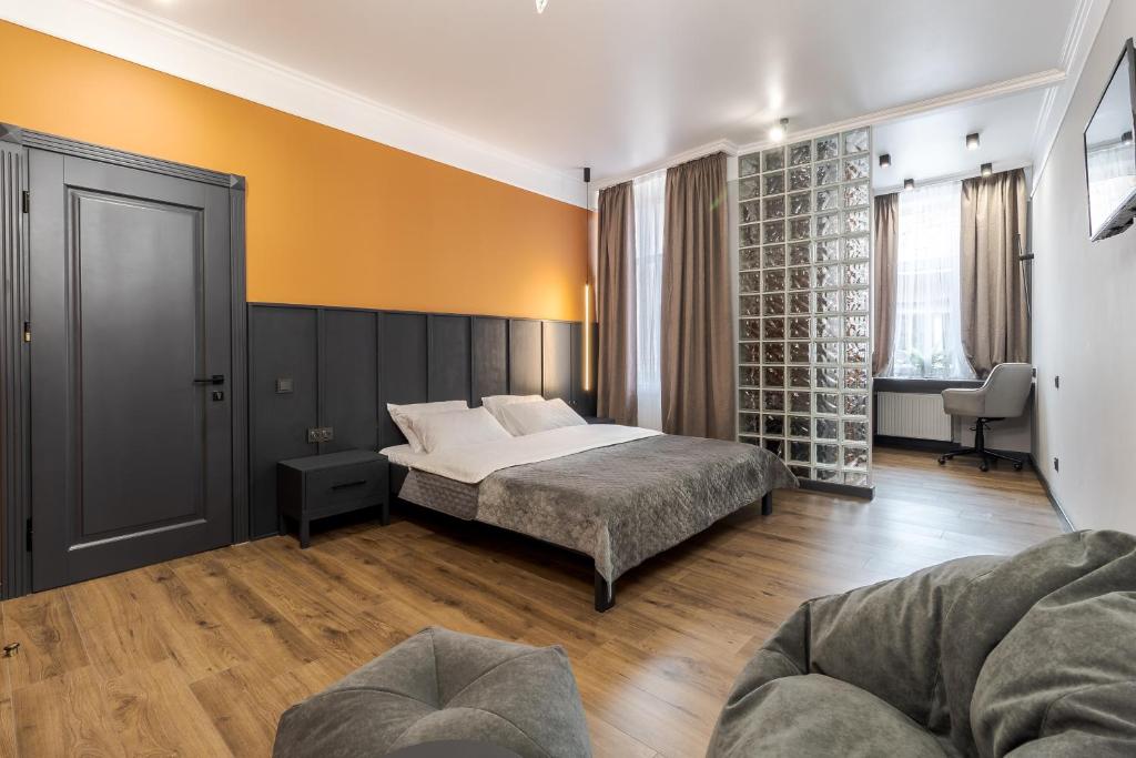 Säng eller sängar i ett rum på Modern Apartment lviv