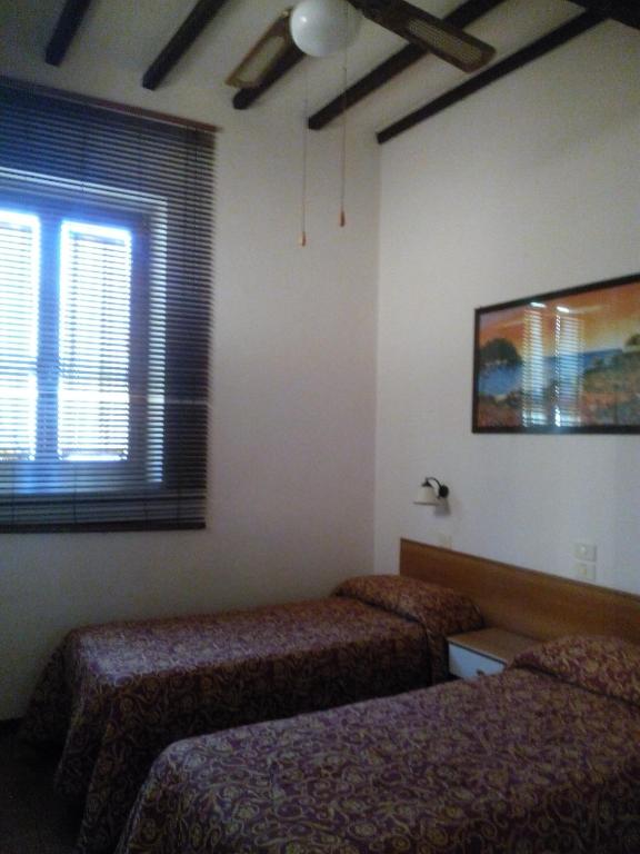 Postel nebo postele na pokoji v ubytování Hotel Lea