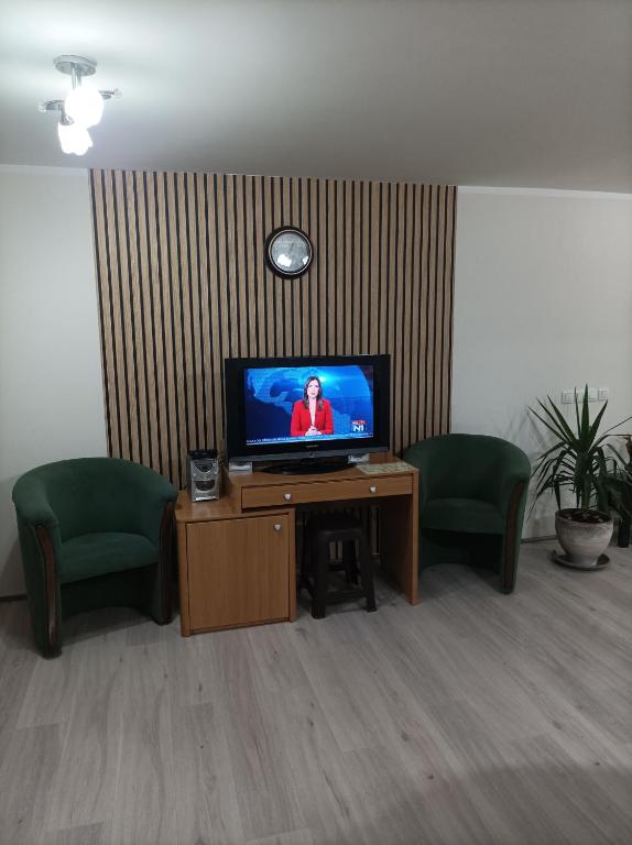 TV a/nebo společenská místnost v ubytování ARIANA apartman